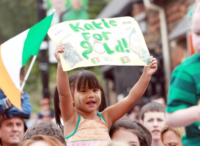 GIRL POWER: A young supporter cheers on Taylor in Bray yesterday.