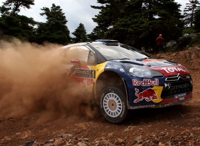 World Champion Sebastien Loeb and his co-driver Daniel Elena with their WRC Citroen DS3.