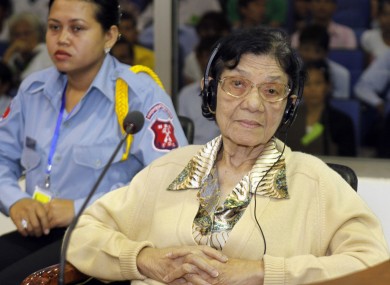 Ieng Thirith, the Khmer Rouge's former Social Affairs Minister and wife to Ieng Sary, the communist group's former Foreign Minister, looks on inside a courtroom of the UN-backed tribunal
