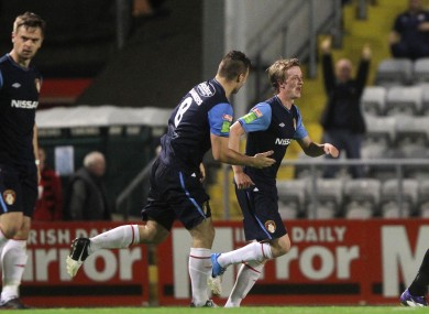 St. Pats' Chris Forrester celebrates scoring the third goal of the game.