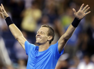 Tomas Berdych, of Czech Republic, reacts after defeating Roger Federer, of Switzerland, in a quarterfinals match at the US Open tennis tournament.