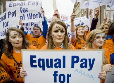 Young teachers attend a demonstration last month seeking equal pay with older counterparts. Many younger teachers are not entitled to the same allowances as older colleagues receive.