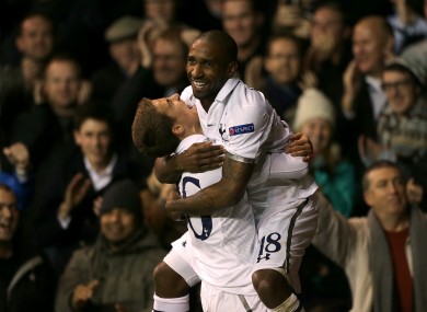 Tottenham Hotspur's Jermain Defoe celebrates scoring his side's first goal of the game with teammate Thomas Carroll (left).