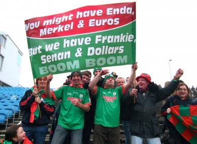 St Brigid's fans celebrate at McHale Park yesterday.
