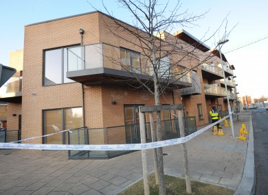 The scene outside the apartment block where the stabbing occurred.