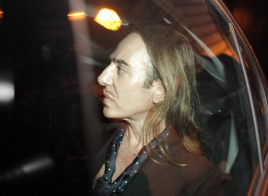 Former Dior designer John Galliano leaves a Paris court house after being given a suspended sentence for anti-Semitic remarks.