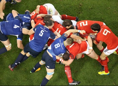 Leinster and Munster contest a scrum at the Aviva Stadium.