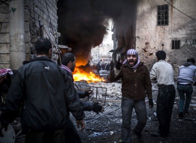 The scene of an explosion in Aleppo yesterday as violence continues in Syria.
