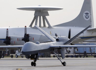 A Predator B unmanned aircraft taxis at the Naval Air Station, Tuesday, Nov. 8, 2011, in Corpus Christi, Texas.