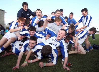 Dungarvan Colleges players celebrate their victory.