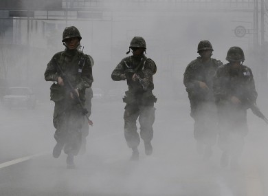 South Korean soldiers taking part in anti-terrorism drills south of Seoul today.