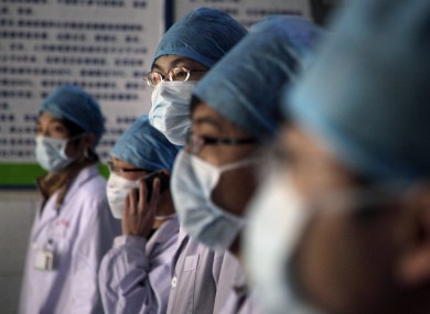 File photo of health workers at a Chinese coal mine.