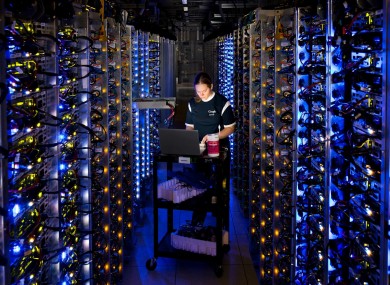 A Google technician working on some of the computers in a data centre in Oregon.