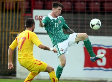 McAlinden (right) playing for Northern Ireland's U21s.