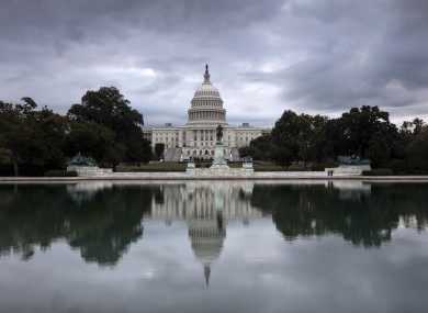 Storm clouds hang over Capitol Hill