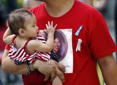 Friends and relatives of the victims of 9/11 terrorist attacks gather at the National September 11 Memorial at the World Trade Center site today.