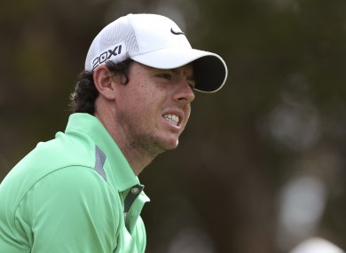 Rory McIlroy of Northern Ireland reacts after teeing off on the 15th during the Australian Open golf tournament.