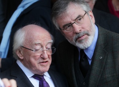 President Michael D Higgins with Sinn Féin's Gerry Adams at a funeral mass for Fr Alex Reid in Dublin this week