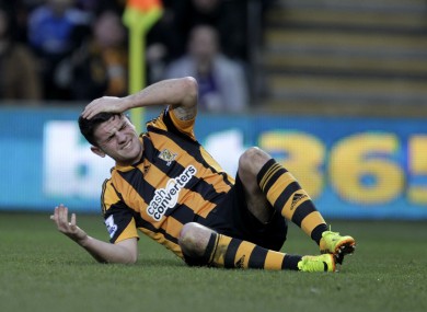 Robbie Brady hits the deck against Liverpool earlier this month.