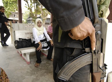 File photo of Thai soldiers at a rural train station.
