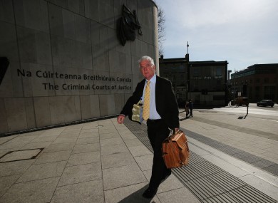 Sean FitzPatrick, the former chairman and one-time chief executive of Anglo Irish Bank, arrives at the Circuit Criminal court, Dublin yesterday.