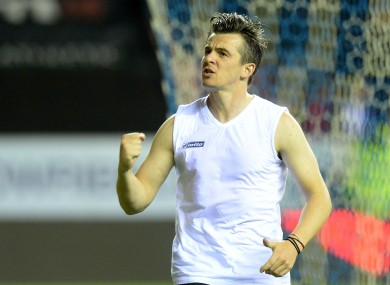 Queens Park Rangers Joey Barton salutes the fans after his team's 0-0 draw with Wigan Athletic.