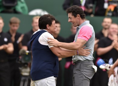 Rosie McIlroy celebrates with her son, Rory, after he won The Open.