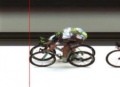 Matteo Trentin edges out Peter Sagan by the narrowest of margins.