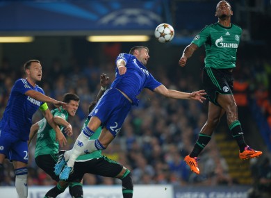 Gary Cahill of Chelsea dives for header during the UEFA Champions League, Group G match at Stamford Bridge.