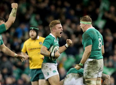 Peter O'Mahony, Ian Madigan and Jamie Heaslip celebrate Ireland's win this evening.