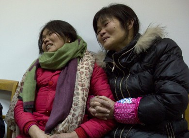 Relatives of Pan Hanqin who was one of the victim of a deadly stampede.