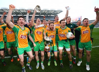 Corofin's players celebrate their victory today.
