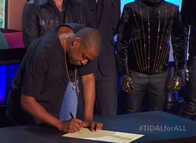 Jay Z signs the declaration of independence
