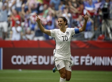 Carli Lloyd celebrates her hat-trick.