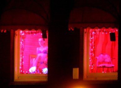 A sex worker in Amsterdam's red light district.