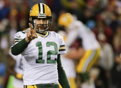 Rodgers threw two touchdowns in the first half before the Packers switched to the running game.