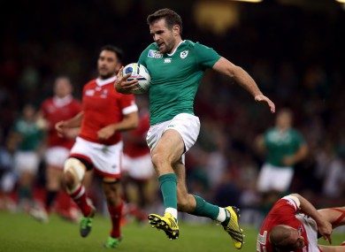 Payne scores against Canada during the Rugby World Cup.
