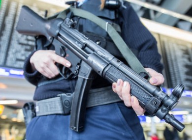 A member of the German federal police secures the terminal area at the airport in Frankfurt am Main, Germany.