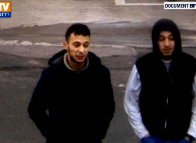 Abdeslam, left, on the day after the attacks.