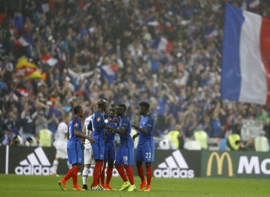 The French players celebrate.