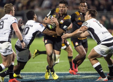 Anton Lienert-Brown on the charge for the Chiefs against the Sharks in a Super Rugby game in April.