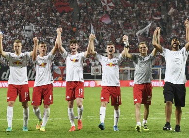 The RB Leipzig players celebrate their win over Borussia Dortmund.