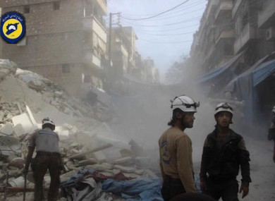 Syrian Civil Defense workers search through the rubble in rebel-held eastern Aleppo.