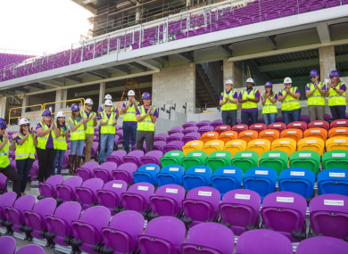 Staff at Orlando City unveil the 49 rainbow-coloured seats at their stadium.