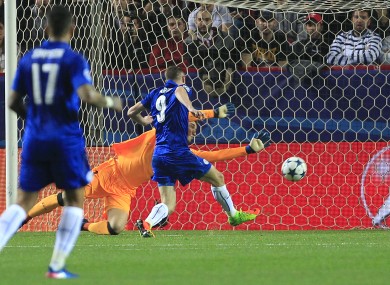 Jamie Vardy pulls one back for Leicester City.