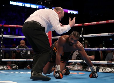 David Haye is counted down by referee Phil Edwards after being knocked down by Tony Bellew.