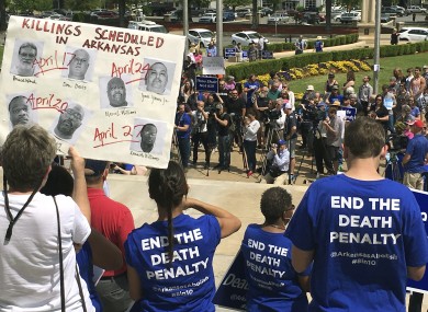 Protesters gather outside the state Capitol building on Friday.