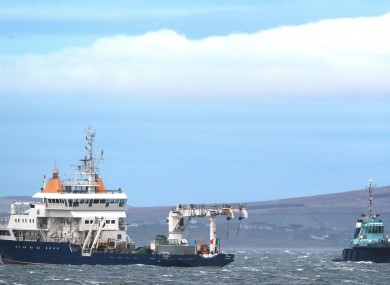 The Granuaile (left) alongside the tug Ocean Challenger during an earlier search.