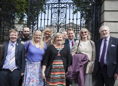 Members of TENI celebrating the passing of the 2015 bill outside the Dáil.