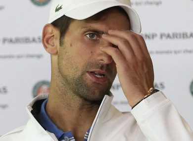 Novak Djokovic answers reporters after his defeat to Dominic Thiem.